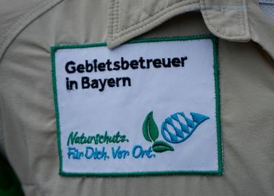 Bild vergrößern: Das Motto der Gebietsbetreuer in Bayern. Vor Ort stößt das Projekt auf großes Interesse